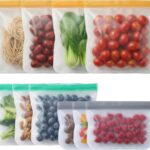 A clear, multicolor set of Anelueeoo reusable freezer bags, including gallon, sandwich, and snack sizes, with various foods i