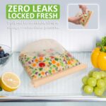 A clear Annaklin 12-pack of reusable silicone food storage bags in various sizes, standing upright.