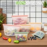 A clear Annaklin 12-pack of reusable silicone food storage bags in various sizes, standing upright.