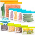 A set of Qinline reusable food storage bags in various sizes with orange, blue, and yellow zippers, filled with fresh food it