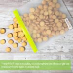 A set of 24 Qinline reusable food storage bags in various sizes (gallon, sandwich, snack) with colorful zipper closures, agai