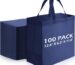 A stack of 100 navy blue reusable non-woven tote bags with handles, neatly folded and ready for use.