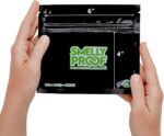 Ten black Smelly Proof reusable food storage bags, 6 by 4 inches, stacked neatly against a neutral background.