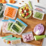 Six transparent SZTCECDM reusable gallon freezer bags with grey zippers, filled with various foods like meat and vegetables.